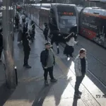 woman-distracted-by-earphones-narrowly-escapes-being-hit-by-train-in-turkey