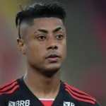 bruno henrique flamengo scaled aspect ratio 512 320 2 BRUNO HENRIQUE É JULGADO AO VIVO NO STJD: ATACANTE DO FLAMENGO É ACUSADO DE MANIPULAÇÃO DE JOGOS