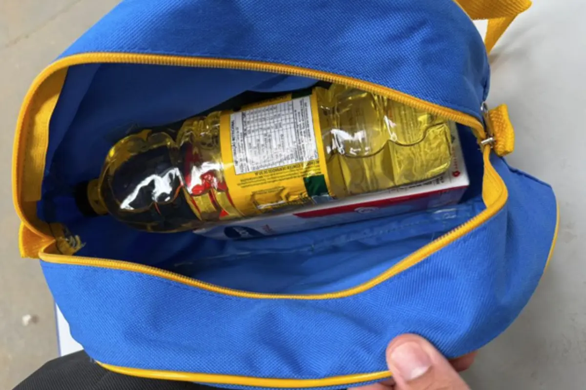 funcionaria-de-escola-e-conduzida-pela-pm-por-suspeita-de-furto-de-itens-da-merenda,-em-anapolis