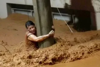 mulher-sobrevive-apos-3h-agarrada-a-um-poste-durante-enchentes-em-mg