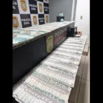 rs:-mulher-joga-dinheiro-em-telhado-vizinho-para-esconde-lo-da-policia