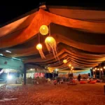 heliporto,-ar-condicionado-e-pe-na-areia:-acampamento-em-aruana-oferece-experiencia-de-resort-no-araguaia;-saiba-valor