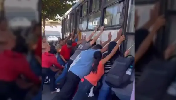 populares-erguem-onibus-para-salvar-motociclista-apos-acidente-em-aparecida;-veja-video