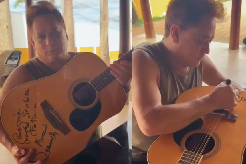 video-mostra-leonardo-autografando-violao-que-sera-leiloado-nesta-quarta-em-festa-de-igreja-de-goianesia