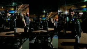 casal-improvisa-mesa-na-lixeira-para-acompanhar-jogo-do-brasil-em-festa-de-rua-no-garavelo:-“virou-um-bistro”
