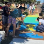 ‘tia,-bora-pintar’:-avenida-de-trindade-ganha-novas-cores-para-copa