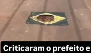 em-clima-de-copa-do-mundo,-moradores-pintam-buracos-nas-ruas-com-cores-do-brasil;-video