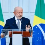 Lula e Trump na cúpula do G7 discutindo eleições brasileiras