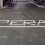 Sinalização inusitada em rua de Goiânia com a palavra 'Pera'