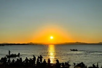 Turistas no Rio Araguaia protegendo-se contra doenças