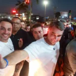 Flávio Bolsonaro e Michelle em evento em Goiás
