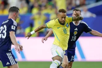 Neymar apagado em ação contra a Escócia