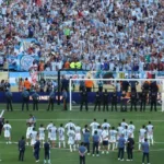 Jogadores da Argentina de costas na comemoração da Espanha