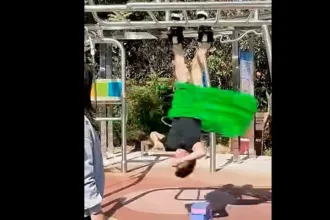 artista-chines-quebra-recorde-ao-equilibrar-33-bamboles-suspenso-de-ponta-cabeca