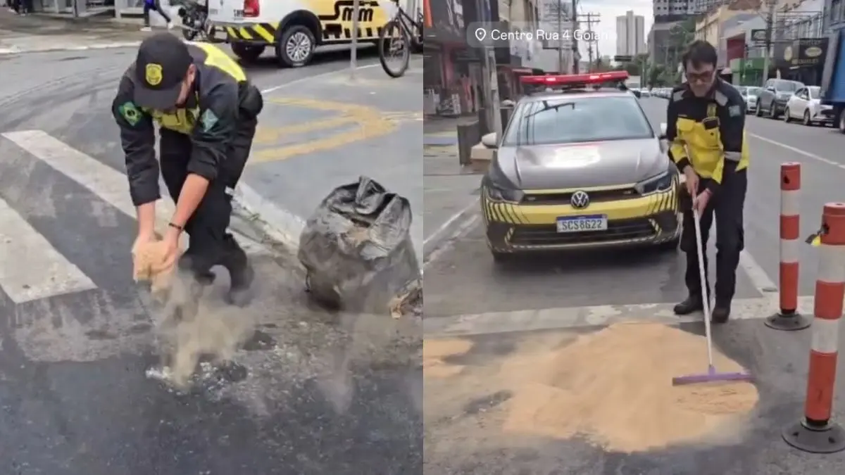 Agentes de trânsito usam serragem para cobrir óleo derramado na rua 4, em Goiânia; vídeo